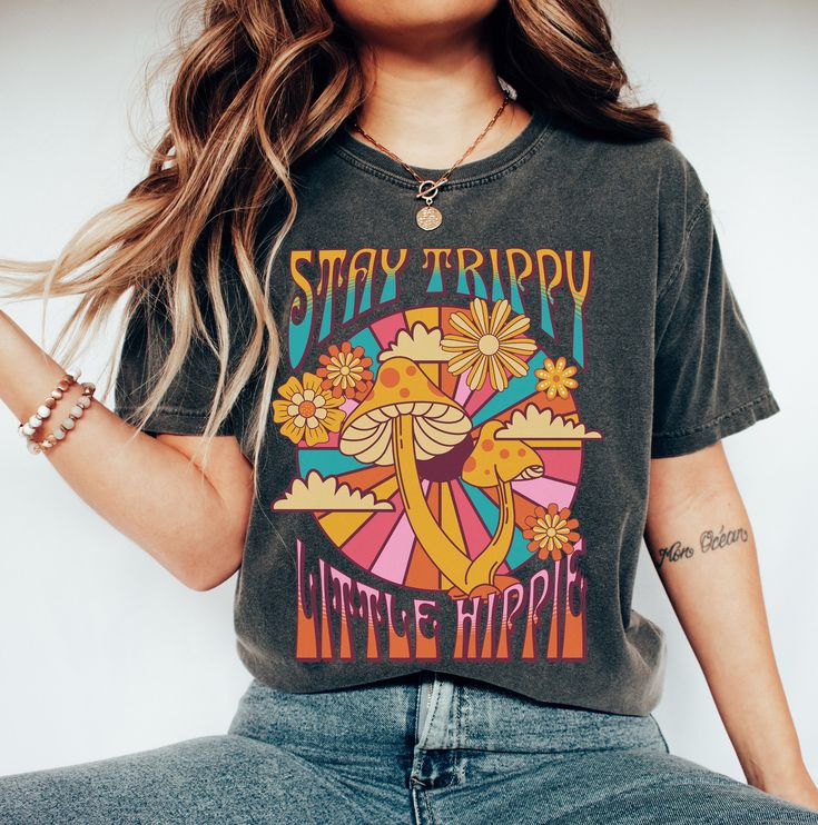 Stay trippy little hippie! Show your free spirited side with this awesome mushroom tee printed on a comfort color shirt. Order a size or two up for that trendy oversized shirt look!  Professionally printed t-shirts, perfect for anyone looking for comfortable and stylish everyday wear. Our t-shirts are made from 100% cotton (excluding heather colors) and feature a comfortable, relaxed fit that's perfect for any occasion. With a variety of trendy designs to choose from, there's a t-shirt for every Music City Nashville, Nashville Music, Epcot Shirts, Rock Vintage, Western Graphic Tees, Country Music Shirts, Disneyland Shirts, Rodeo Shirts, Hippie Shirt