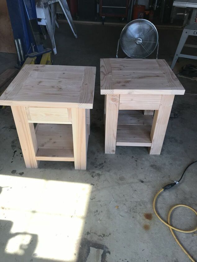 two wooden tables sitting next to each other