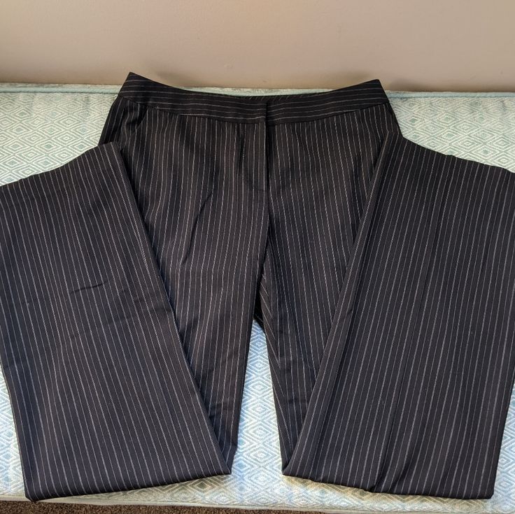 Semantiks Pinstripe Dress Pants In Used Condition, Some Pilling Around Waistband Area. Pants Feature Two Pockets In The Front And Two Unopened Faux Pockets In The Back For Decoration. Pants Are A Combination Of Polyester Rayon And Spandex. New To Poshmark? Use My Referral Code Kallie_chic When You Sign Up And You'll Get A $10 Discount On Your First Purchase Over $10 From Poshmark! :) Fitted Striped Pants For Office, Elegant Striped Stretch Pants, Fitted Vertical Stripe Pants For Business Casual, Fitted Black Pants With Vertical Stripes, Elegant Fitted Pants With Vertical Stripes, Tailored Black Bottoms With Vertical Stripes, Fitted Pinstripe Office Bottoms, Pinstripe Fitted Office Bottoms, Fitted Pinstripe Bottoms For Office