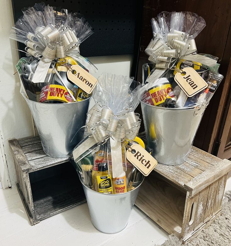 three buckets filled with candy sitting on top of a shelf