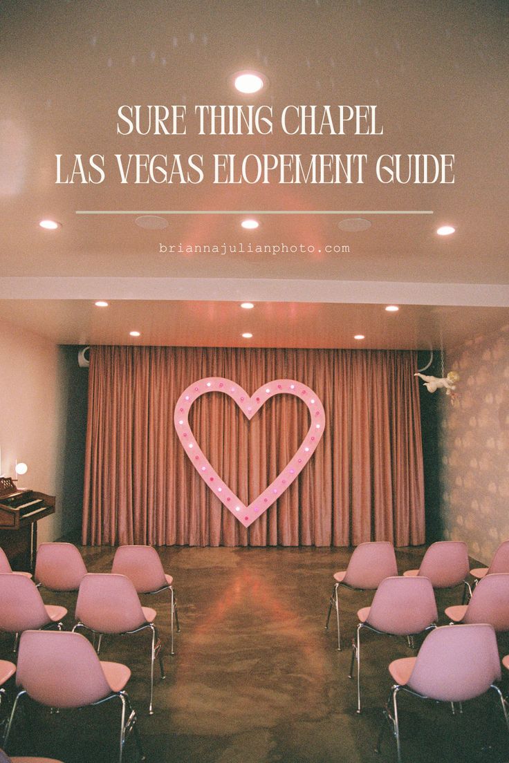 there is a pink heart in the middle of a room with chairs and a sign that says sure thing chapel las vegas's development guide