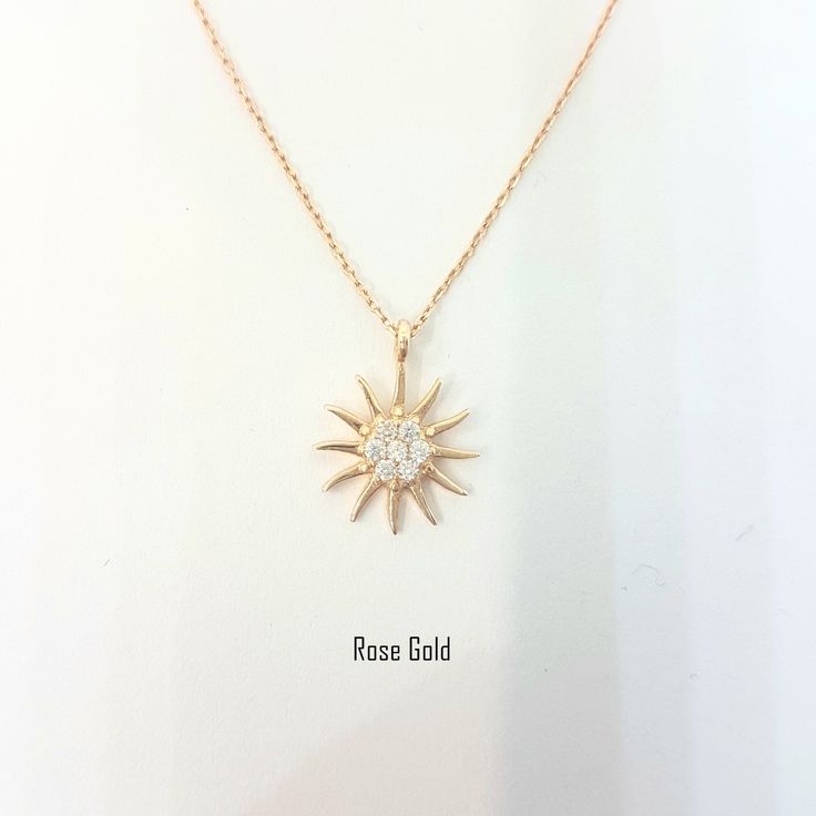 -The sun shaped pendant is made with high-quality 14K solid gold. Also we have listed bracelet and earrings with the same models. So you can combined them. https://www.etsy.com/shop/LatikaJewelryShop - High polish finish and set with flawless cubic zirconia stones. - This dainty, delicate and trendy pendant necklace has been artfully designed for timeless yet modern millennial fashion and you can order in three different colors, yellow , white and rose. - This 14K solid gold pendant comes with a Trendy Pendant Necklace, Gold Sun Necklace, Millennial Fashion, Snowflake Bracelet, Sun Necklace, Artfully Designed, Sun Pendant, Tiny Charm, Handmade Fine Jewelry