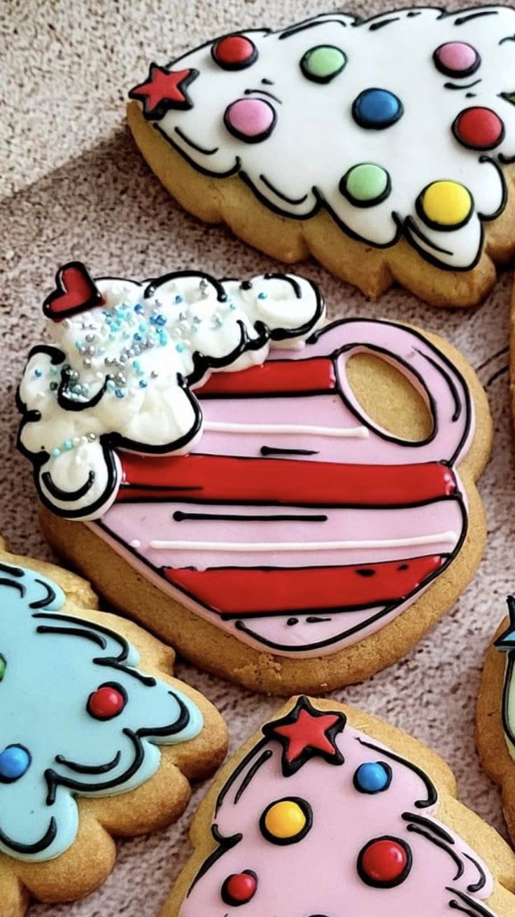 some decorated cookies are laying on the floor