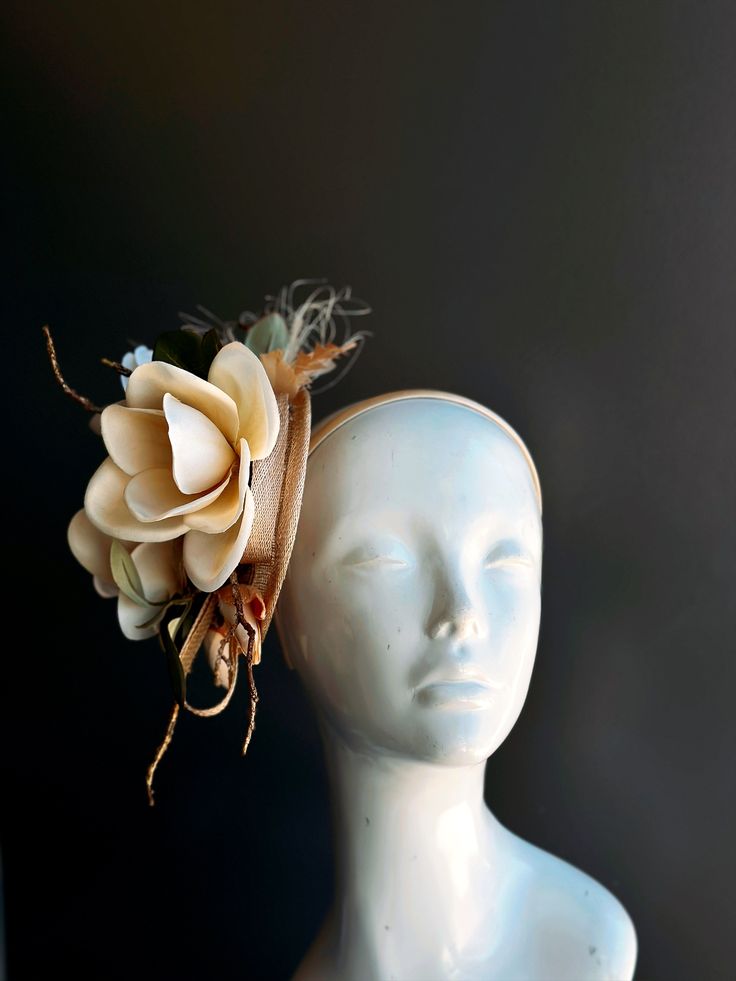 Crafted with intricate precision, the lifelike Magnolia petals and delicate details are a testament to the elegance of this sinamay fascinator hat. Its natural charm and beauty will have you looking like a true Southern belle, perfect for tea parties and Kentucky derby. Age Group/Gender - Adult/Women Size/Type - One size fits all adults Sinamay Fascinator, Flower Fascinator, Tea Party Hats, Kentucky Derby Hats, Fascinator Hat, Masks Masquerade, Type One, Magnolia Flower, Tea Parties