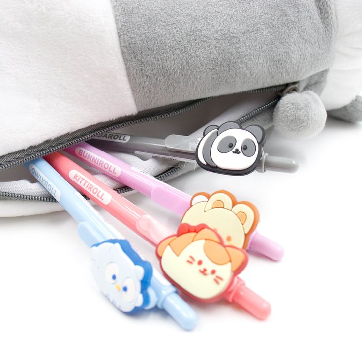 Anirollz™ Kittiroll Cute Animal Character Plush Pencil Pouch Anirollz friendz will keep your pens, pencils, markers, and many more school supplies safe altogether! Anirollz have unusual, squishy bodies shaped like rolls. These uncont-roll-able animalz can't help but roll around everywhere they go, especially their comfort food. Kawaii Kitty Cat character It has an adorable animal tail zipper pull. Size : Approx. W 3.5" x L 3.75” x H 9.5” Material : Polyester Fiber One main zippered compartment. Cute Stationery With Pen Holders For Back To School, Playful School Stationery With Pen Slots, Kawaii Pen Holders For Back To School, Playful Pencil-shaped Pencil Case With Pen Holders, Novelty School Pencil Case With Pen Holders, Novelty Pencil Case With Pen Holders For School, Playful Pencil Stationery For Everyday Use, Playful Back To School Pencil Case, Playful Stationery With Pen Holders For Everyday Use