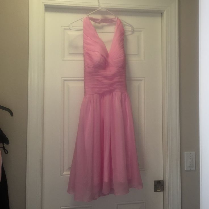 Blush Chiffon Halter Dress; Hits Below Knee. Never Worn. Pink Sleeveless Chiffon Bridesmaid Dress, Sleeveless Pink Chiffon Bridesmaid Dress, Elegant Pink Chiffon Dress For Wedding Guest, Pink Fitted Chiffon Dress For Wedding Guest, Fitted Pink Chiffon Bridesmaid Dress, Elegant Pink Chiffon Bridesmaid Dress, Pink Knee-length Chiffon Dress, Feminine Pink Knee-length Chiffon Dress, Pink Chiffon Dress For Summer Formal Events