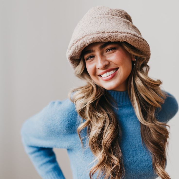 Meet our new Sage Sherpa Bucket Hat! This accessory is perfect for the fall/winter months, keeping you warm and stylish all season long. The Sage hat includes a thicker band around the head to add extra detail to the hat, and it's adjustable! Available in 2 colors including mocha and cream. Material: 100% Polyester Brown Short Brim Hat For Cold Weather, Beige Curved Brim Crochet Hat For Winter, Cozy Hats For Cold Weather And Fall, Warm Short Brim Beanie For Fall, Warm Brimmed Bonnet For Fall, Warm Hats For Cold Weather In Fall, Warm Short Brim Hat For Fall, Warm Fall Hat With Short Brim, Brimmed Crochet Hat For Cold Weather