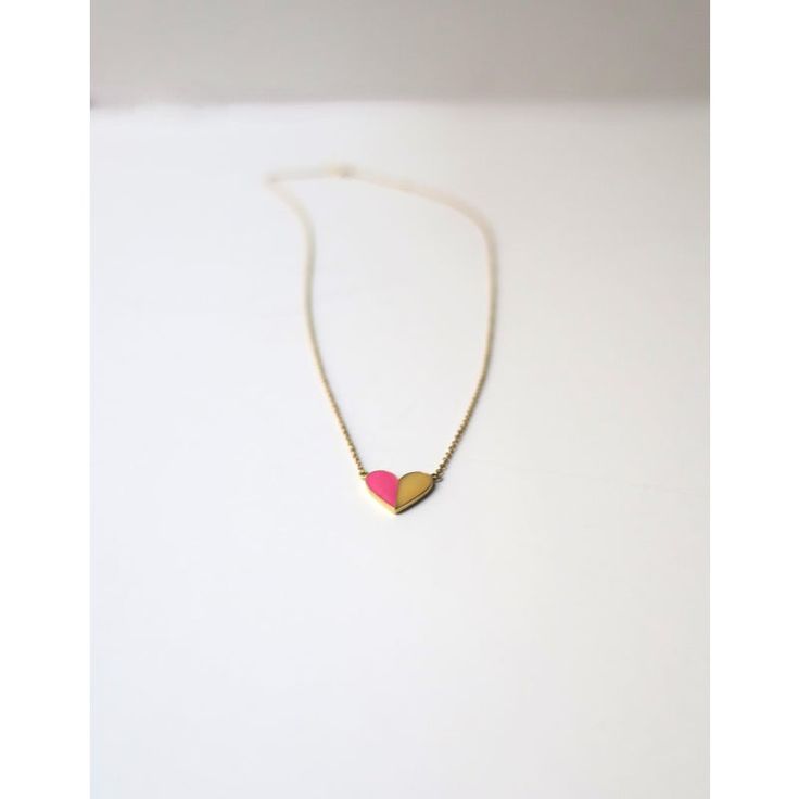 This is part of Chairish’s Fine Jewelry assortment.  A beautiful Italian 14-karat gold and enamel (bright pink and yellow) heart necklace. Colors are reminiscent of the Italian summer spirit beach coast. Beautiful as a standalone necklace or stack with other necklaces. Necklace has two-length options (16" and 16.5"), please see second to last close-up image. Marked 14-karat on back of heart as shown in last image. Also marked on chain clasp '585', which is an Italian jewelry mark. Very good cond Pink 14k Gold Jewelry With Heart Charm, 14k Gold Pink Jewelry With Heart Charm, Dainty Heart-shaped Pink Gold Necklace, Dainty Pink Gold Heart Necklace, Pink Heart Pendant Jewelry With Adjustable Chain, Pink Delicate Chain Jewelry As Gift For Her, Pink Delicate Chain Necklaces As Gift For Her, Heart-shaped 14k Yellow Gold Jewelry, Pink Necklace With Adjustable Chain For Her