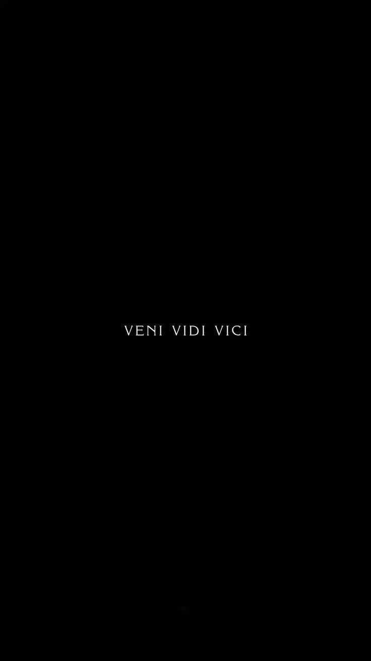 a black background with the words veni vidi vici written in white