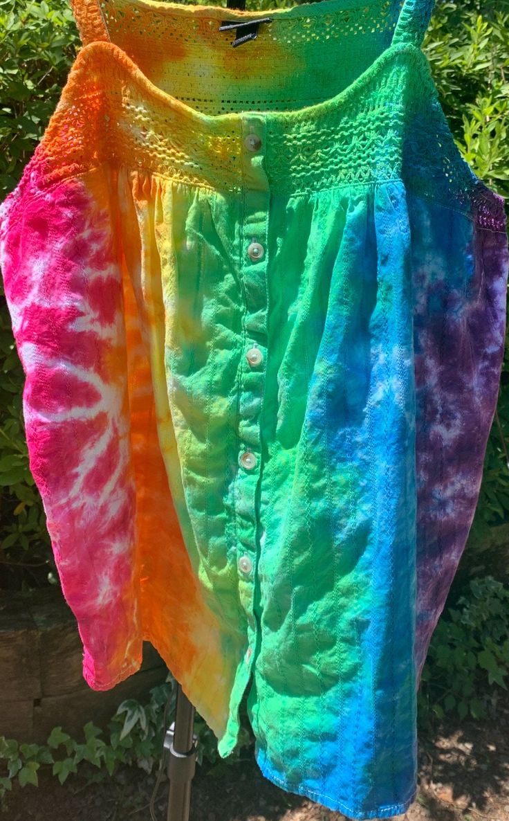 Women's hand dyed tie dye tank top from Torrid in a size 1x/14-16 with adjustable straps and lots of details! Multicolor Hand Dyed Tops For Summer, Bohemian Tie Dye Tank Top For Festivals, Multicolor Bohemian Tank Top With Spaghetti Straps, Hand Dyed Sleeveless Top For Spring, Hand Dyed Multicolor Sleeveless Tops, Acid Wash Sleeveless Summer Top, Rainbow Sleeveless Top For Summer, Hand Dyed Sleeveless Bohemian Tops, Hippie Multicolor Tank Top For Summer