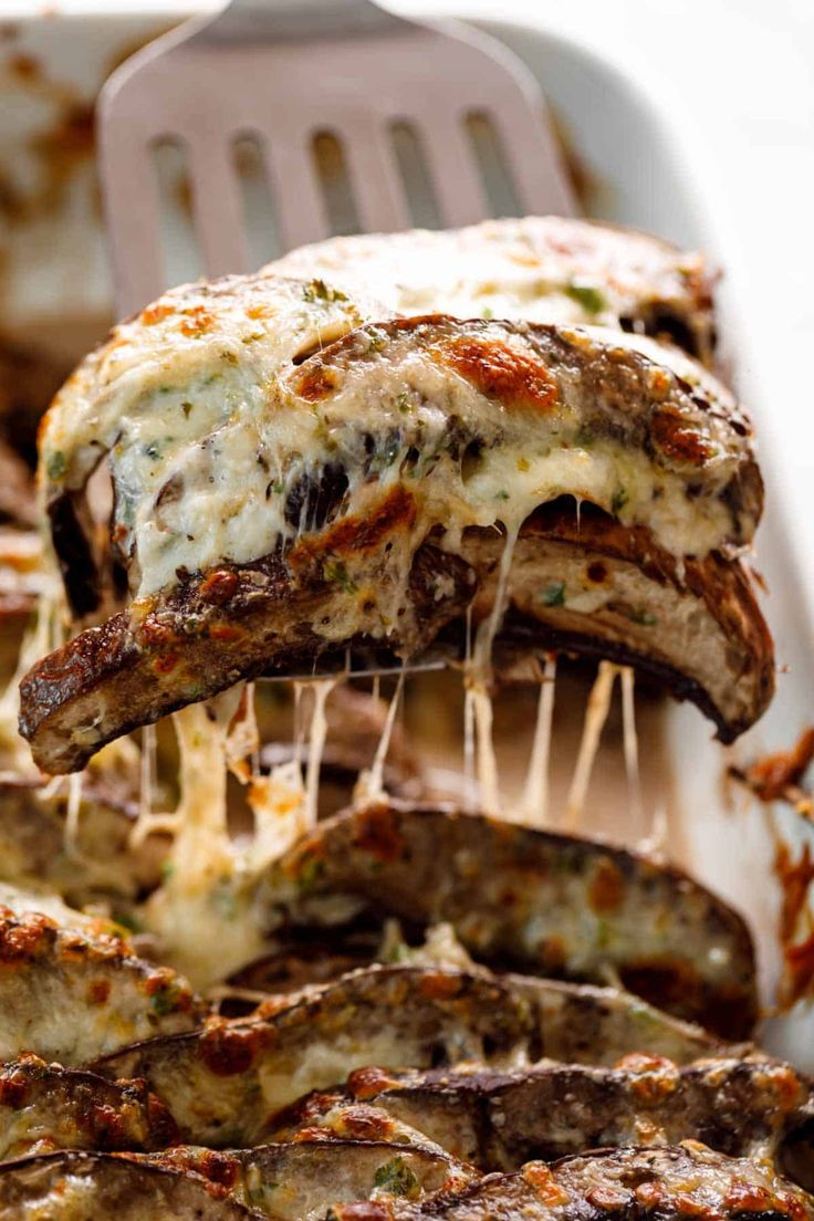 a close up of food on a fork in a pan