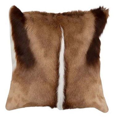 a brown and white pillow with fur on the front, one side is made out of faux