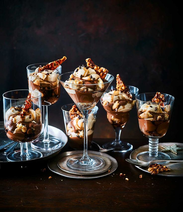 three desserts in glasses on a table with the words espresso martini trifles