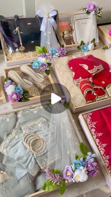 the table is covered with many different types of wedding dresses and accessories for brides