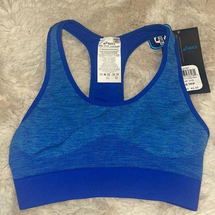 Brand New With Tags Blue Womens Asics Sports Bra Blue Functional Sports Bra With Light Support, Blue Seamless Sports Bra For Athleisure, Blue Racerback Sports Bra For Light Sports, Blue Sporty Sports Bra With Seamless Construction, Blue Fitted Racerback Sports Bra, Blue Sports Bra With Seamless Construction For Workout, Seamless Blue Sports Bra, Blue Sports Bra With Light Support For Gym, Functional Blue Sports Bra With Medium Support