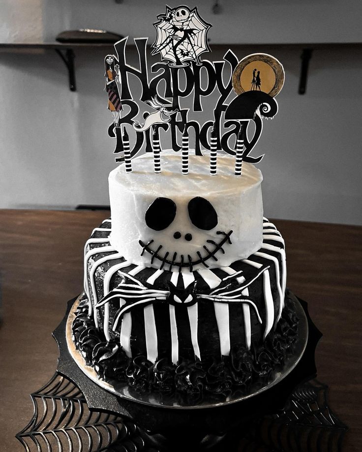 a birthday cake with a skeleton on top