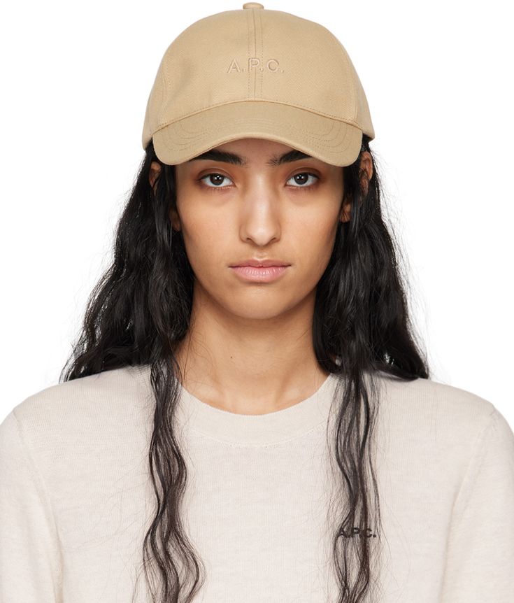 Cotton canvas cap in beige. · Embroidered eyelets at crown · Logo embroidered at face · Curved brim · Cinch fastening · Webbing browband · Twill lining Supplier color: Dark beige Classic Cream Baseball Cap With Curved Visor, Beige Hat With Embroidered Logo And Short Brim, Beige Baseball Cap With Curved Visor, Classic Beige Visor Dad Hat, Cream Curved Brim Baseball Cap With Embroidered Logo, Cream Baseball Cap With Embroidered Logo, Beige Flat Brim Hat With Embroidered Logo, Beige Baseball Cap With Short Brim For Spring, Classic Beige Dad Hat With Curved Visor