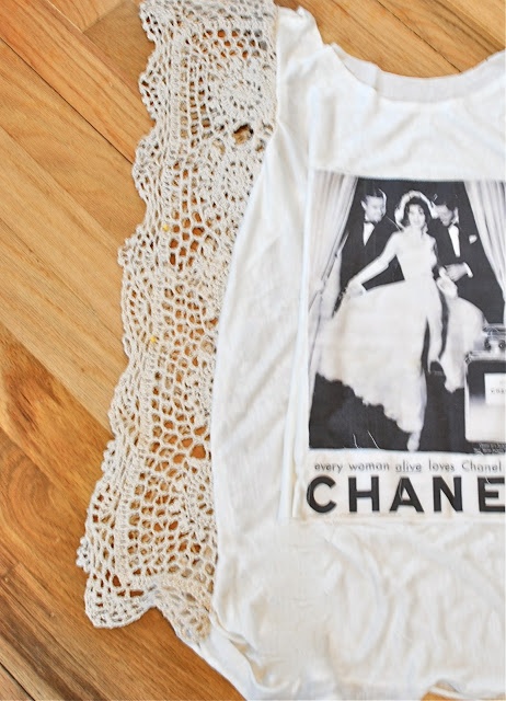 a white t - shirt with the words chanel on it and a lace doily