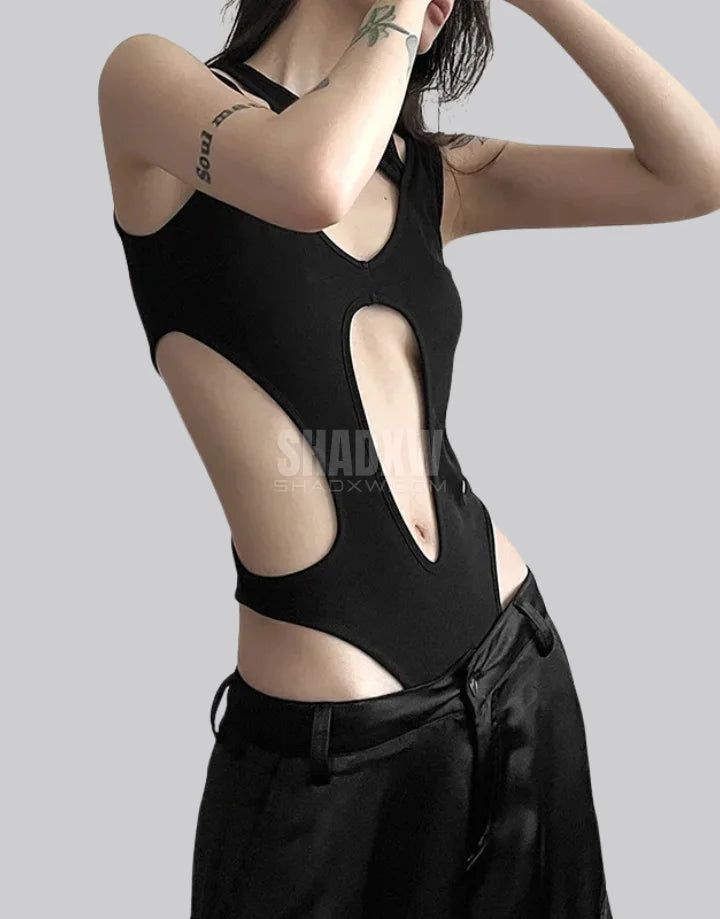 Type: Techwear bodysuit Design: Street Goth Ultra-resistant crop top: Designed with the best materials for a comfortable wear. Breathable materials: This bodysuit is made of polyester, spandex and nylon. Suitable for women Machine washable: 30 °C (86 °F) Size(cm | in) Bust Waist S 70-83 65-78 M 74-87 69-82 L 78-91 73-86 Black Streetwear bodysuit Meticulously designed for the fashion-forward individual, this bodysuit stands as a testament to the boldness inherent in the techwear aesthetic. The bo High Waist High Stretch Bodysuit For Night Out, Sleeveless Elastane Bodysuit For Club, Edgy High Stretch Bodysuit For Club, High Stretch Edgy Bodysuit For Club, Seamless Stretch Bodysuit For Club, Trendy Sleeveless Nylon Bodysuit, Edgy Stretch Bodysuit For Club, Trendy High Stretch Black Bodysuit, High Stretch Bodysuit For Club