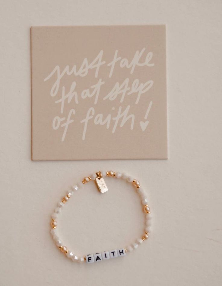 Details Beaded Stretch Bracelet 6.75" before stretch, size fits most Verse Reference on Attached Gold Tag Inspired by verse 2 Corinthians 5:7“For we live by faith, not by sight.” Made in USA Meaningful White Hypoallergenic Beaded Bracelets, Meaningful White Beaded Hypoallergenic Bracelets, Meaningful White Adjustable Beaded Bracelets, White Spiritual Rosary Bracelet For Everyday, Everyday White Beaded Rosary Bracelet, Inspirational White Stretch Bracelet For Everyday, Inspirational Hypoallergenic Stretch Bracelet With Round Beads, White Inspirational Stretch Bracelet With 8mm Beads, Inspirational White Bracelet With 8mm Beads