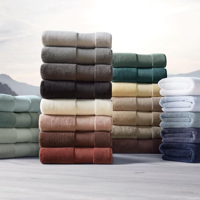 a stack of folded towels sitting next to each other