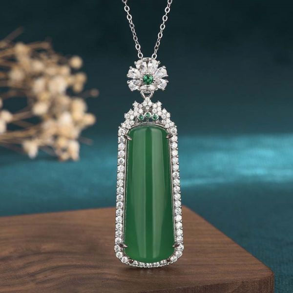 As a gift for your loved ones, this limited-stock Cyan Jade Longevity Pendant Necklace will be perfect!What does jade symbolize?⭐ Prosperity ⭐ Abundance ⭐ Luck ⭐Jade has been long known and valued for its beauty and powers of healing as well as protection. Its widely regarded as a very important stone, especially if doing business, transacting with a client, closing a sale, or conducting any kind of business deal. It is believed that Jade will help you maintain a positive attitude towards money, Jade Clavicle Chain Pendant Jewelry, Elegant Jade Pendant Crystal Necklace, Elegant Jade Crystal Necklace As Gift, Elegant Jade Crystal Necklace For Gift, Emerald Large Pendant Jewelry Gift, Green Jade Necklaces For Weddings, Jade Pendant Jewelry As A Gift, Jade Necklace With Large Pendant For Gifts, Wedding Jade Necklace With Round Pendant