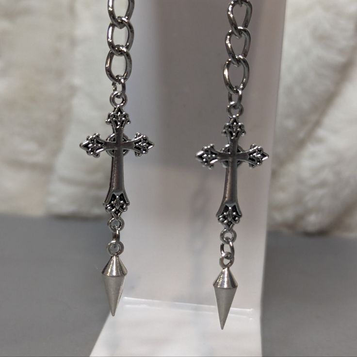 Cross Charm Earrings With Chain And Silver Spike Comes On Stainless Steel Fish Hook Earrings. #Cross #Silver #Crosses #Earrings #Gothic Earrings Silver Dangle, Silver Spike Earrings, Goth Cross Earrings, Upside Down Cross Earrings, Gothic Silver Jewelry, Silver Gothic Jewelry, Cybersigilism Jewelry, Cross Earrings Aesthetic, Gothic Piercings