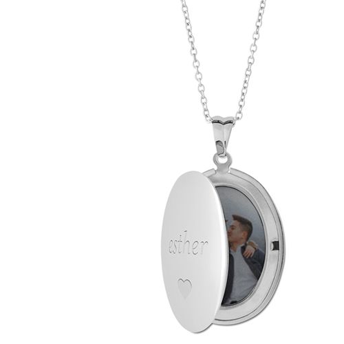 Made of stainless steel, with your choice of silver, gold or rose gold finish. Oval Locket measures 1.2 x 0.9, photo insert measures 0.9 x 0.6. Heart Locket measures 1.07 x 1.09, photo insert measures 0.8 x.85. Engraving available on front side only. Photos already sized and inserted inside. Comes with 18 coordinating chain and gift box. Imported. Personalized in USA Silver Oval Locket Necklace With Adjustable Chain, Personalized Oval Link Locket Necklace As Gift, Personalized Oval Link Locket Necklace For Gifts, Engraved Stainless Steel Oval Pendant Necklace, Silver Locket Necklace For Valentine's Day, Oval Locket Necklace For Valentine's Day, Silver Round Locket Necklace For Valentine's Day, Sterling Silver Locket Necklace With Oval Link For Gifts, Sterling Silver Oval Locket Necklace Gift