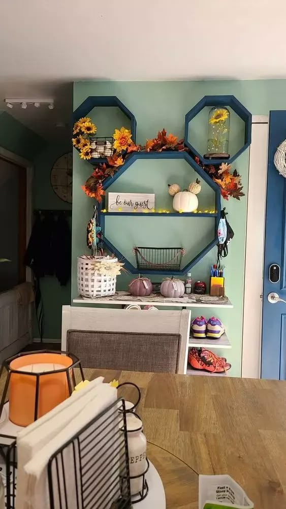 a dining room table with plates and baskets on it