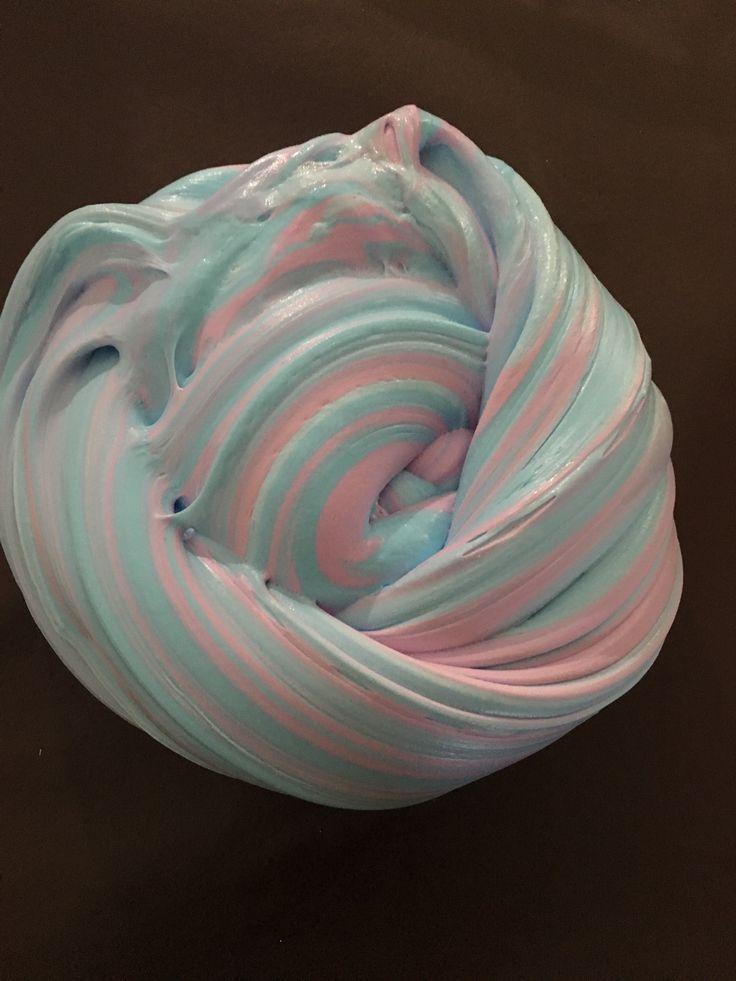 there is a blue and pink swirled substance in the bowl