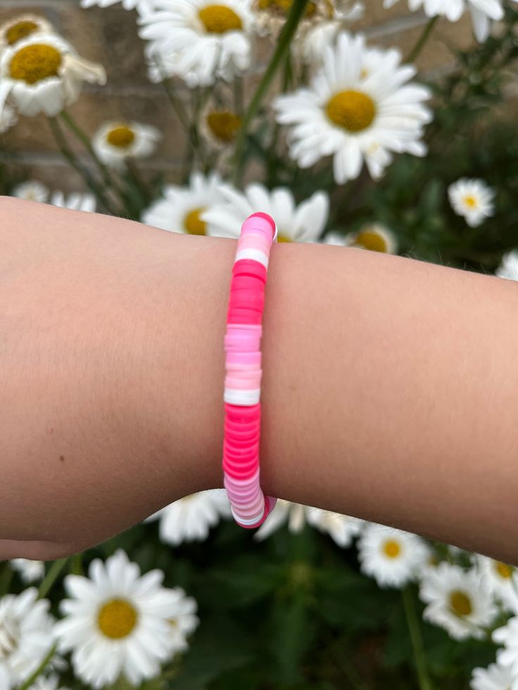 pink and white clay bead bracelet with gold cube beads at the bottom. Hot Pink Clay Bead Bracelet, Fancy Clay Bead Bracelets, Pink Clay Bead Bracelet, White Clay Bead Bracelet, Pink Clay Bead, Perle Plate, Bracelet Stuff, Clay Bead Ideas, Neon Jewelry