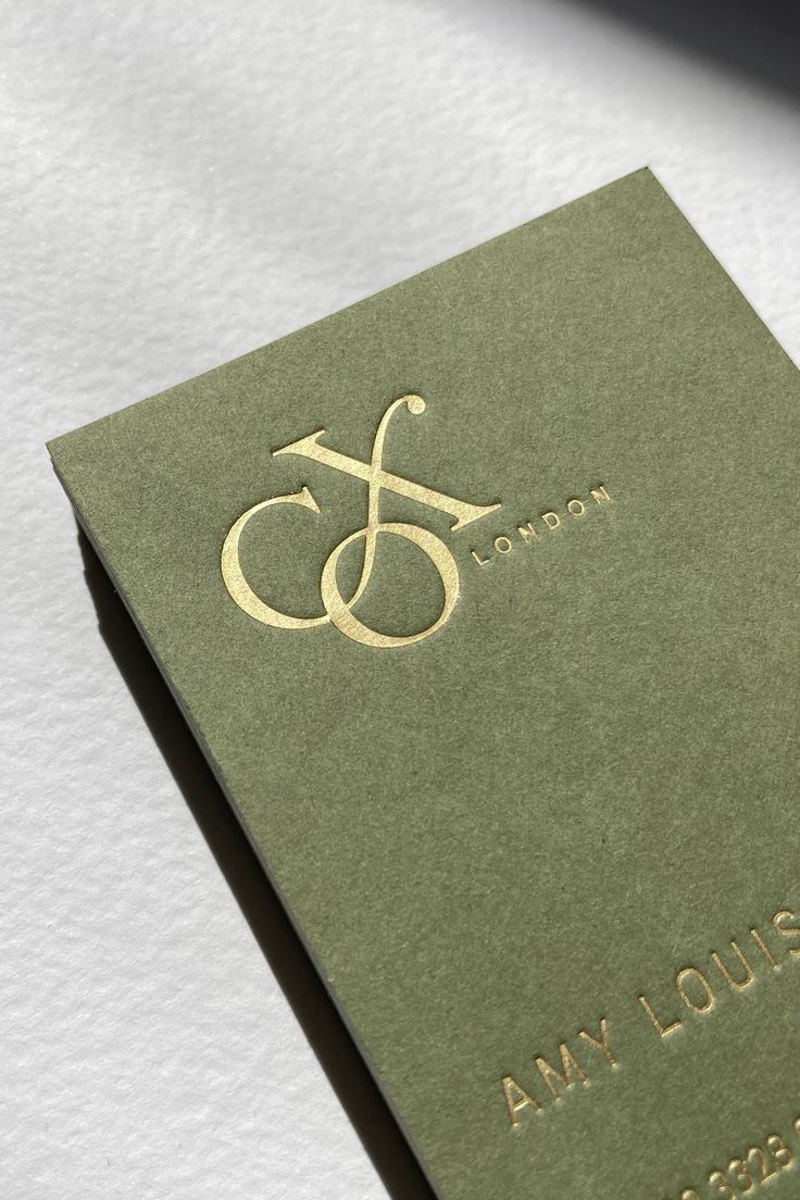 Satin gold foil stamped business cards, using a wild green card. Olive Green Packaging Design, Luxury Green Packaging, Green Gold Packaging, Olive Green Branding, Green Gold Branding, Green And Gold Branding, Debossed Business Card, Gold Stationery, Gold Foil Business Cards