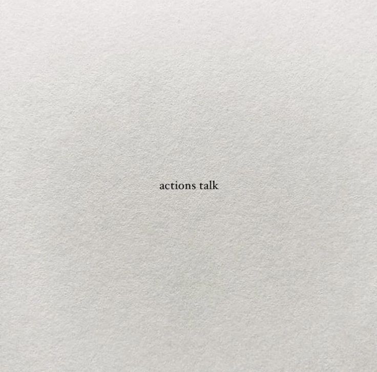 the words actions talk are written in black on white paper