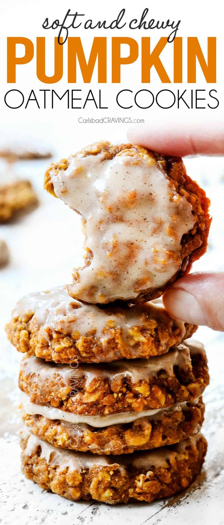 a stack of pumpkin oatmeal cookies with icing