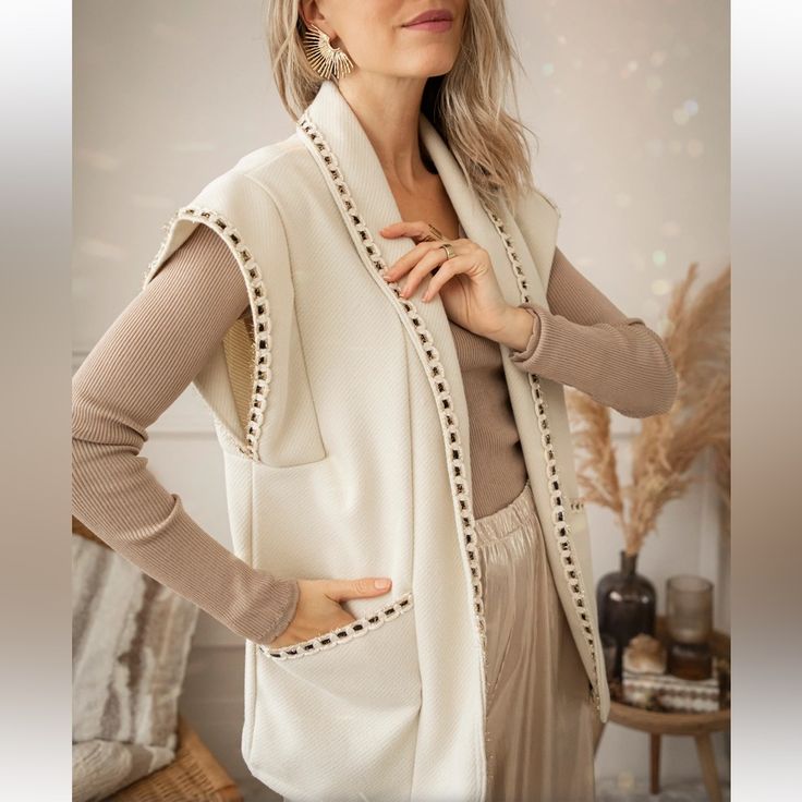 You'll Fall In Love With Beautiful Romy Beautiful 'Romy' Will Be A Permanent Fixture In Your Closet, This Beautiful Sleeveless Cardigan Will Complete All Your Party Fits! I Provided Her In Two Contrasting Colors, Then You Can Choose Your Favorite! Will You Go For Black Or Cream?.. Fitted Sweater Vest For Fall Day Out, Chic Beige Sweater Vest For Fall, Cream Sweater Vest For Winter Layering, Fall Sweater Vest For Day Out, Chic Sweater Vest For Fall Day Out, Elegant Beige Sweater Vest For Fall, Beige Vest For Day Out In Spring, Chic Cream Sweater Vest For Spring, Fitted Beige Outerwear For Layering