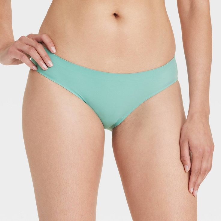 Get a great no-show option for any outfit with this Bonded Microfiber Bikini Underwear from Auden™. This mid-rise bikini underwear features a cotton gusset, bonded edge and lingerie hem, and comes in assorted colors and prints. The bonded microfiber fabric feels soft against your skin, and the added spandex offers you a comfy fit that moves with you as you take on your day. Auden™: Comfort true to every shape & hue. Solid Stretch Tankini Brief, Solid Color Stretch Tankini Brief, Solid Color Stretch Tankini With Briefs, Fitted Seamless Summer Slip, Seamless Fitted Summer Slip, Seamless Fitted Slip For Summer, Summer Seamless Fitted Slip, Micro-elastic Brief Tankini For Summer, Fitted Seamless Brief Swimwear