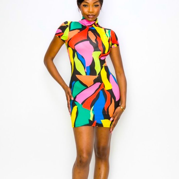 Muticolored Mini. Has Stretch. Vibrant Mini Dress For Spring, Trendy Multicolor Mini Dress, Multicolor Vibrant Print Mini Dress For Party, Trendy Multicolor Abstract Print Dress, Vibrant Spring Mini Dress, Vibrant Multicolor Spring Mini Dress, Colorful Mini Dress With Vibrant Print For Spring, Chic Multicolor Mini Dress, Spring Rainbow Print Short Sleeve Dress