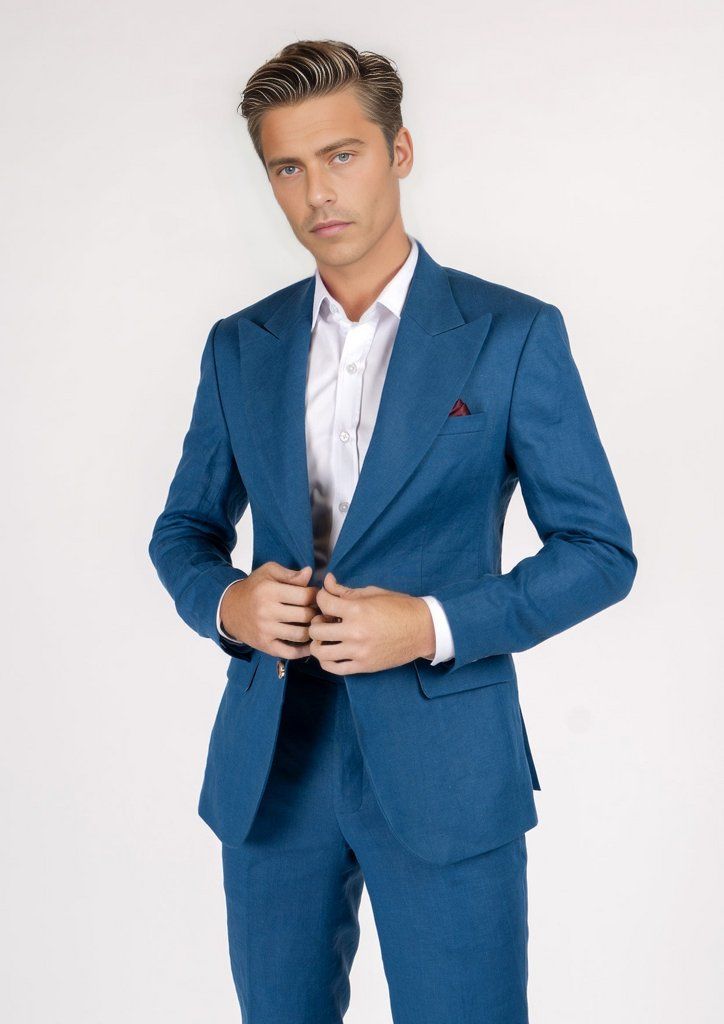 The Hudson Marine Blue Linen Suit is the perfect expression of summer luxury. Crafted from 100% linen in a vibrant marine blue hue, this custom suit will make an elegant statement wherever you wear it. Perfect for hot summer days, its lightweight fabric will keep you looking sharp while feeling cool and comfortable. Summer Blue Blazer With Suit Collar, Blue Summer Blazer With Suit Collar, Blue Linen Blazer For Workwear, Elegant Blue Summer Suits, Luxury Tailored Suits For Summer, Blue Notch Lapel Blazer For Summer, Summer Linen Suit With Suit Collar, Luxury Tailored Summer Suits, Tailored Blue Summer Suits