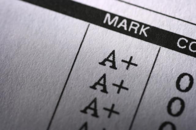 closeup of the mark on a metal sheet with numbers and symbols in black and white