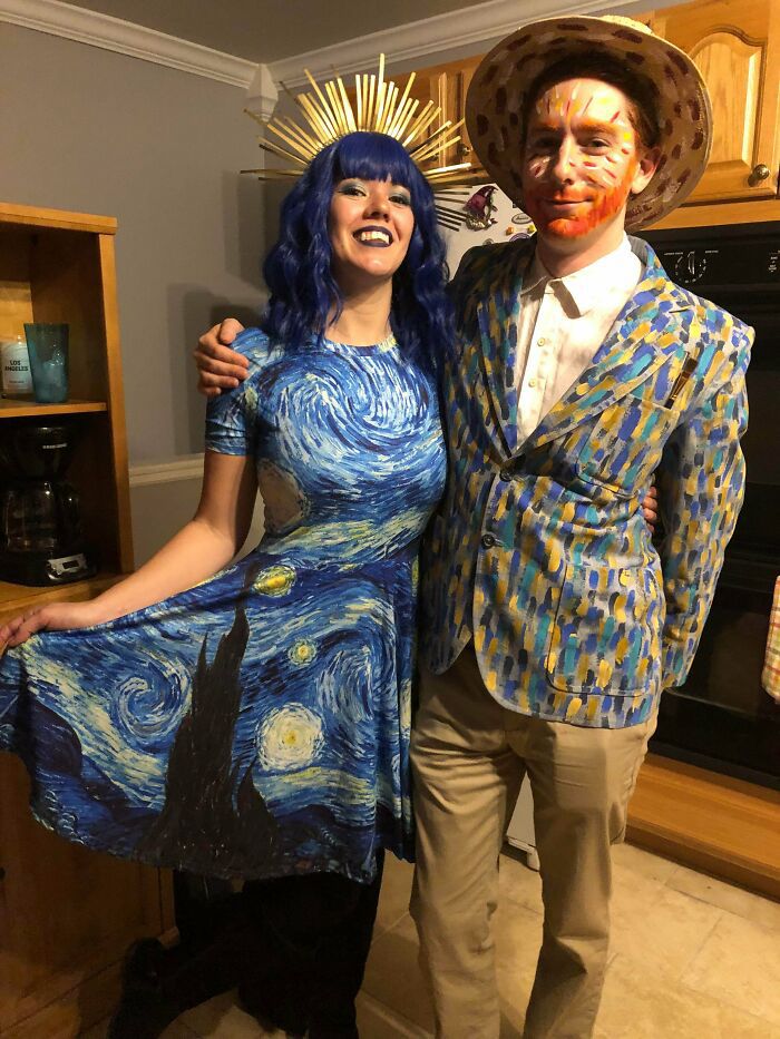 a man and woman dressed up as the starry night characters for halloween costume contest