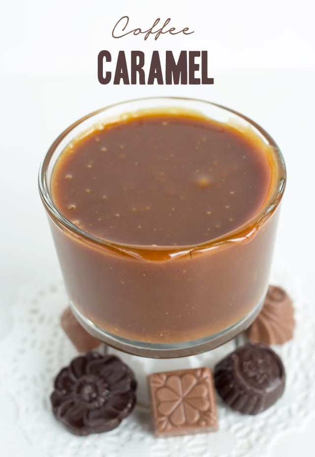 a glass cup filled with caramel and chocolate