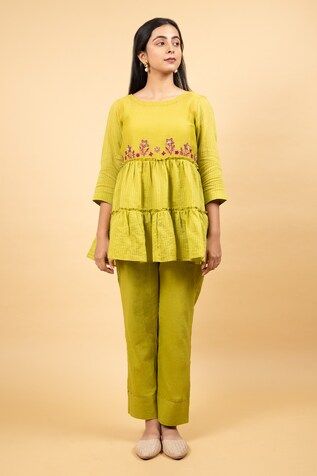 Lime green tunic featuring contrast pink floral and sequin embroidery with tiered detailing. Paired with a sequin detailed pant and an inner slip. - Aza Fashions Tunic With Pants, Pant Women, Green Tunic, Sequin Embroidery, Tunic Pattern, Pant Sets, Floral Tunic, Sequins Embroidery, Aza Fashion