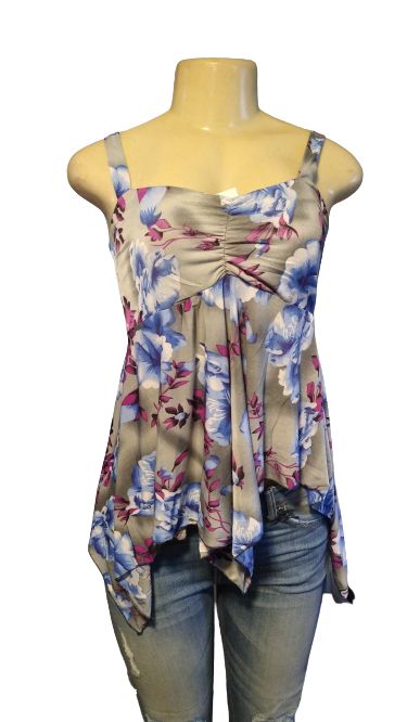 Take this top on vacation with you this year! It is a very cute baby doll blue top, material is soft to the touch and has a floral print to it in blue, purple, and white tones. It is true to size. Has lots of stretch! Would make a good pregnancy top. Material is 65% spandex and 35%polyester Purple Floral Print Top For Day Out, Summer Floral Print Purple Tops, Purple Floral Print Summer Top, Summer Purple Floral Print Top, Floral Print Stretch Tops For Vacation, Casual Purple Floral Print Tops, Blue Floral Print Sleeveless Top, Blue Floral Print Stretch Top, Blue Sleeveless Floral Print Top