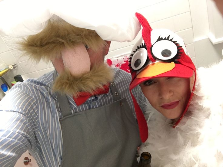 two people dressed up as angry birds in the kitchen