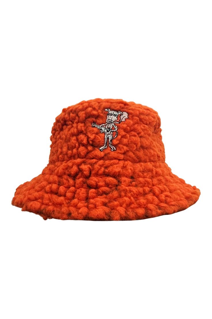 Introducing the Bucket Hat—a bold fusion of sophistication and edge. Crafted from a premium blend of 42% virgin wool, 34% acrylic, and 24% polyester, this hat combines warmth with distinctive style. Featuring a striking, embroidery embellishment, it adds a touch of rebellious spirit to your look. Made in the USA with European fabric, this bucket hat is the perfect statement piece for those who embrace individuality and make their own rules. Product Details Bucket Hat42% Virgin Wool/ 34% Acrylic/ Sherpa Bucket Hat, European Fabric, Walking Art, Man Hat, Public Relations, Fabric Care, 10 Days, Hats For Men, Bucket Hat