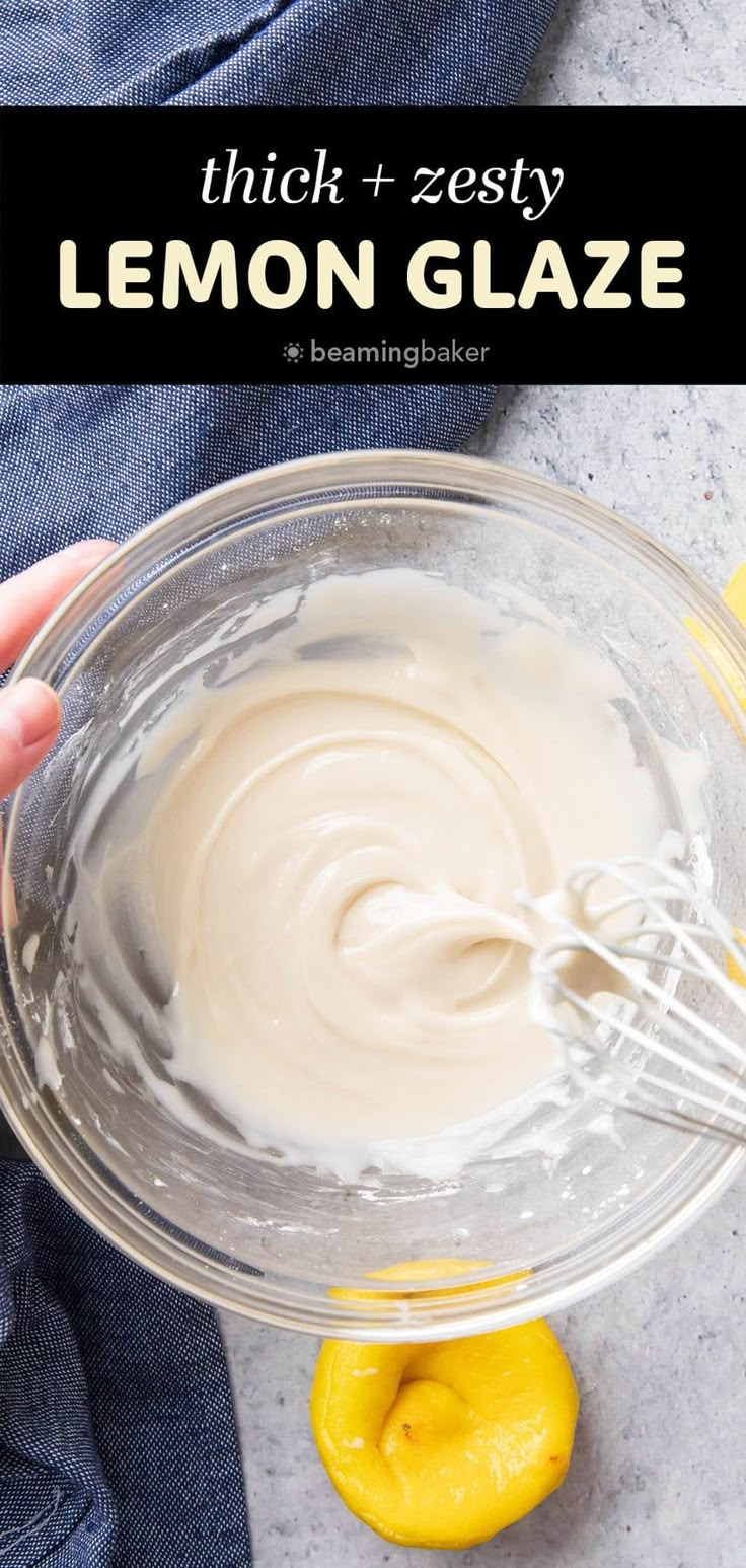 someone mixing lemon glaze in a glass bowl