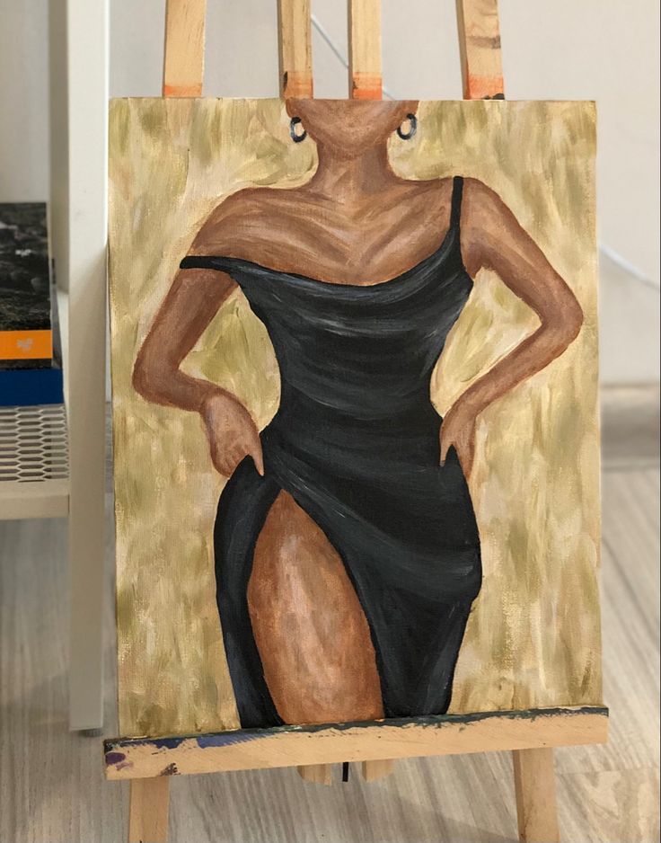 a painting of a woman in a black dress on an easel