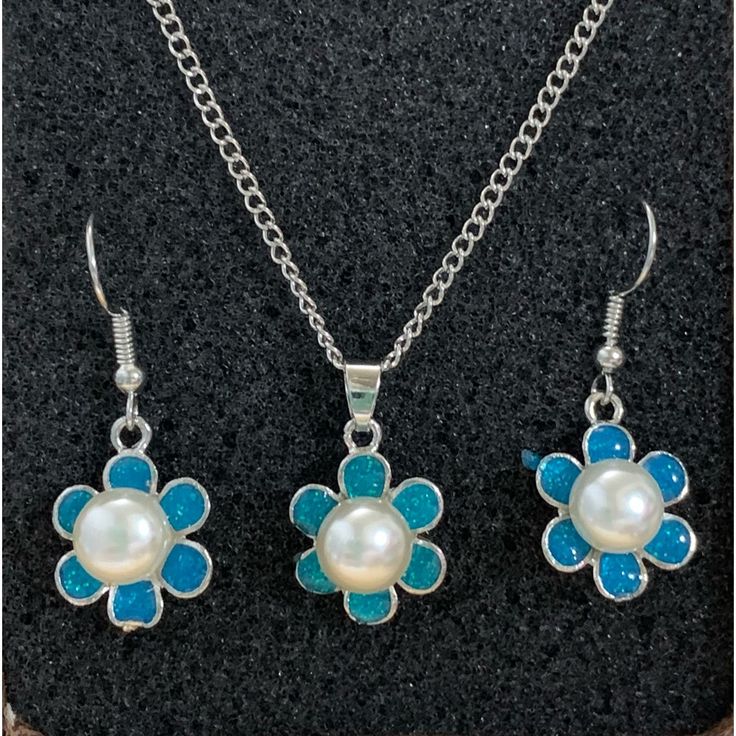 Cute Necklace And Earrings Jewelry Set. Sweet Glittery Blue Resin And Pearl Flowers. Perfect Fit For That Special Young Lady. Chain Is 17”. Cute Blue Round Jewelry, Cute Blue Hypoallergenic Jewelry, Pearl Flowers, Pearl Necklace Set, Kids Accessories Jewelry, Necklace For Girlfriend, Kids Necklace, Women Necklace, Cute Necklace