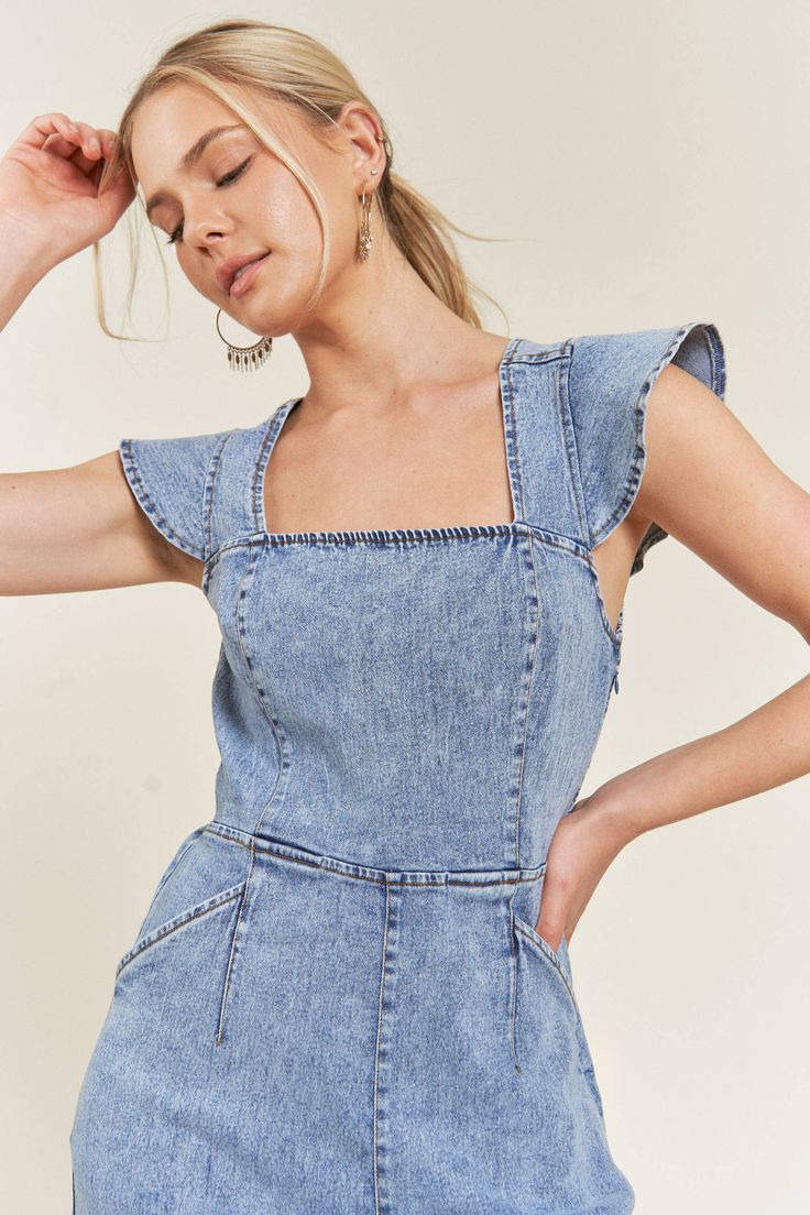 CUTENESS OVERLOAD! This wide leg denim jumpsuit is perfect for spring and summer, with playful tie details, smocked backing, and ruffle sleeves. Don't miss out on this must-have piece! Fits true to size Neck Stretches, Ruffle Sleeves, Denim Jumpsuit, Wide Leg Denim, Cuteness Overload, Trinidad And Tobago, Square Neck, Stretch Denim, Front Pocket