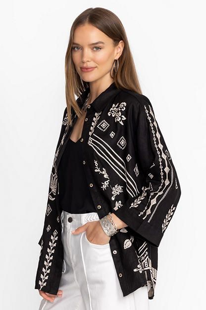 Crafted from 100% linen, the Francis Kimono Sleeve Shirt is embellished with a unique ornate pattern. Featuring a traditional button front adorned with pearl buttons, this beautiful top is finished with flowing bell sleeves for a hint of drama. Pair with a black fitted skirt and strappy heels for a dinner out with friends. Johnny Was Women's Kimono Sleeve Shirt in Black, Size Large, 100% Linen Elegant Linen Tops With Floral Embroidery, Elegant Blouse With Floral Embroidery And Relaxed Fit, Traditional Linen Shirt For Spring, Elegant Embroidered Relaxed Fit Blouse, Designer Summer Tops With Buttons, Chic Embroidered Linen Top, Elegant Embroidered Tops With Relaxed Fit, Linen Embroidered Button-up Top, Linen Button-up Top With Embroidery